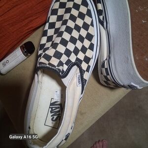 Vans Black and White Checkered Slip-Ons